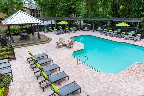 Resort-style pool with spacious  lounge chairs.