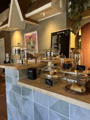 Pastry case and coffee menu