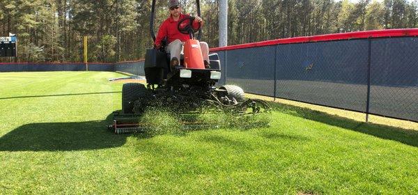 Reel Mowing baseball fields.