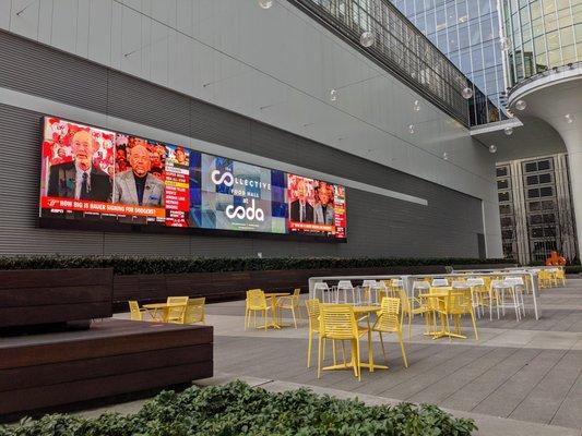 Outside on Coda's beautiful patio. Plenty of seating outside the Collective (what they call the food court / food hall here).