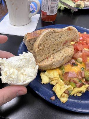 Tomato basil bagel with regular cream cheese