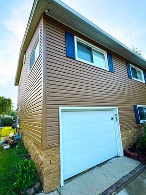 Stunning makeover with Mastic Quest Vinyl Siding, Evolve Stone, and K-Guard gutters. Contact U.S. Exterior Chicago to transform your home!