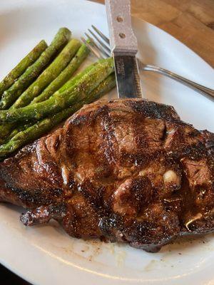 Pork chop and asparagus.