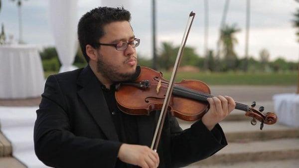 Violinist performing at special wedding ceremony