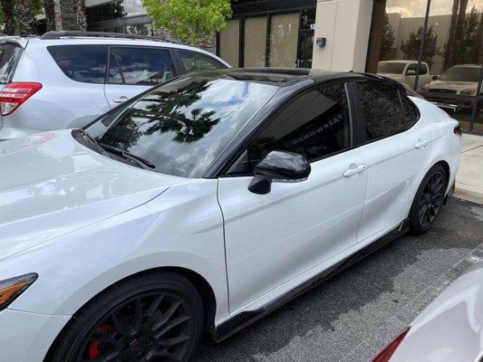 Light color, ceramic tint on the windshield. Dark color, ceramic tint on the back inside windows..