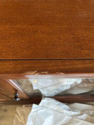 Damage to solid wood tv stand