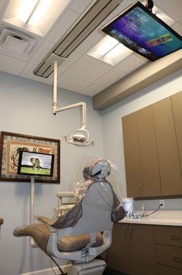 Watch movies while you get your teeth cleaned.