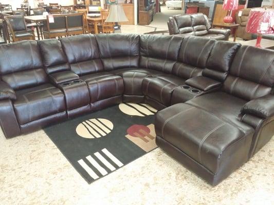 Come get you this great sectional with a chaise, cup holders and storage. Ask for Lawrence and enter for the monthly drawing...