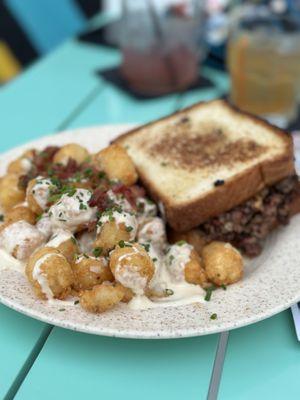 Brisket grilled cheese with trashy tots