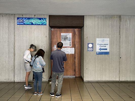 This the entrance to the office at the end of a short hallway.