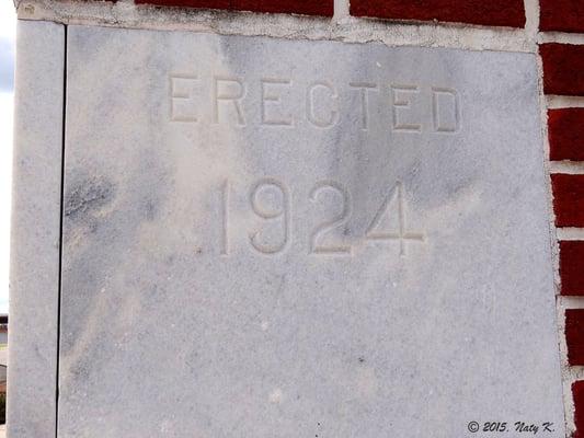 The church's plaque, signaling its 1924 erection.