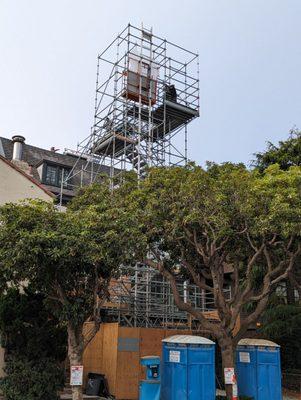 Stair tower with lift for stone paving install @ roof deck