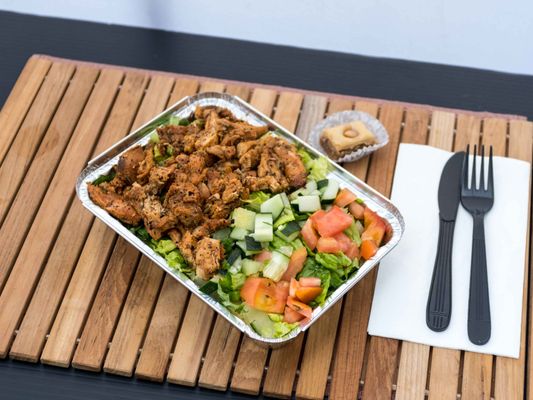 Mediterranean Grilled Chicken  on a bed of salad