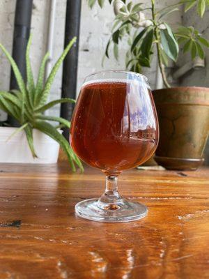 Red wine barrel aged black currant saison