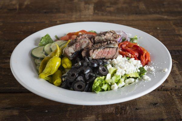 dr. greek with grilled beef tenderloin