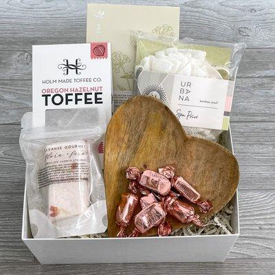 Lotion, shower steamer, toffee, wooden heart bowl, truffles, luxury gift box.