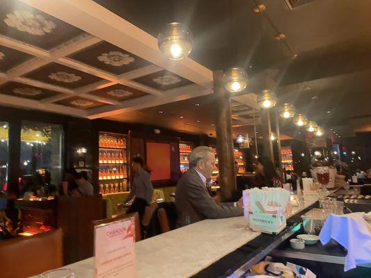 View down the bar and of the entrance from our seats at the end of the bar