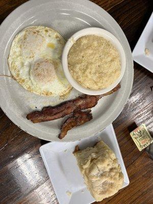 Breakfast Plate with Over Easy Eggs,Grits, Bacon, & Biscuit