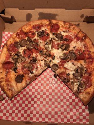 Sausage, pepperoni and mushroom pizza that was very good!