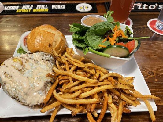 I think this was the raven burger, side salad and shoestring  fries.  Up in the corner is a berry beer