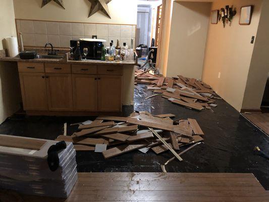 Removal of a laminate floor due to water damage