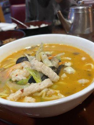 Seafood soup. Spicy with good flavor. Would prefer more squid and zucchini in it tho.