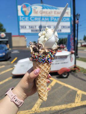 Cappuccino Crunch & Blueberry Cheesecake on a waffle cone