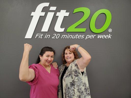 Peggy and Jean flexing after their workout.