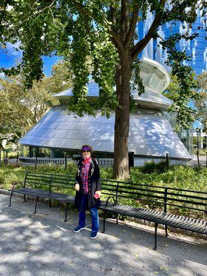 My lovely wife standing in front of the UFO like SeaSide Carousel !