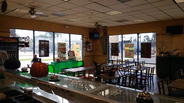 Clean dining room with TVs and wifi.