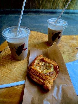 Two ice draft lattes with whole milk and everything cheese danish