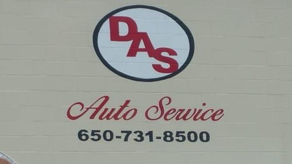 New location  signs .Das auto bigger and better.