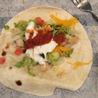 Grilled chicken soft taco with sour cream and salsa! Yummy!