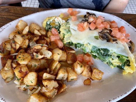 Omelet and home fries. Very good.