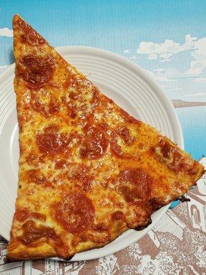 Pepperoni Slice, Toppings Are Partially Covered with Cheese - one of a kind Deliciousness!!