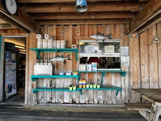 The window where you grab your food and get your condiments.