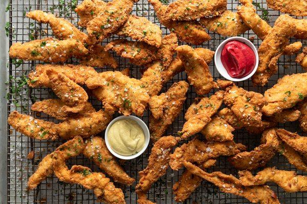 Almond-crusted chicken fingers with 37g of protein per serving, totally gluten-free. Try them with our homemade honey mustard or beetchup!