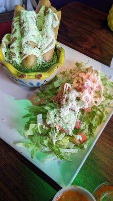 Yummy Flautas in a salsa bowl.