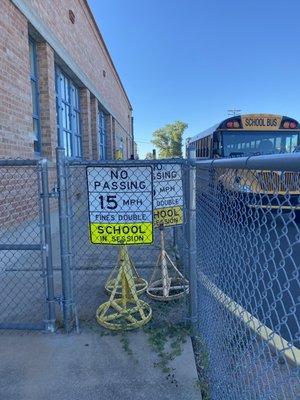 Schools lock up crosswalk signs do children have to run thru traffic