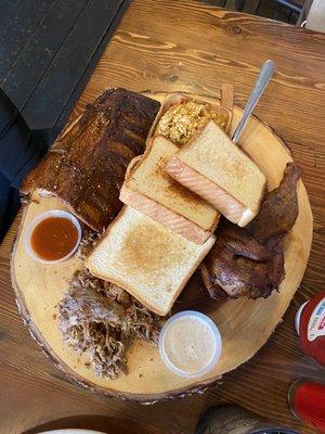 Ribs, chicken, pulled pork, slaw, potato salad, and bread! Great BBQ!!