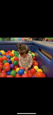 Having lots of fun in the ball pit