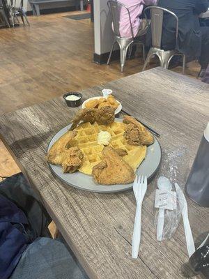 Chicken wings and waffle with a side of fried shrimp