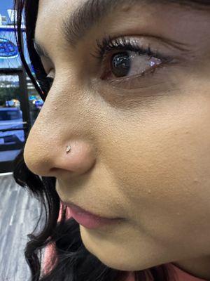 Nostril piercing by Athena