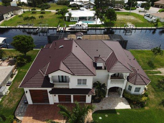 Roof completed: Metal roof that is much more hurricane proof and looks beautiful!