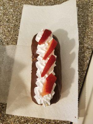 Chocolate Frosted Long John with Whipped Cream and Strawberries