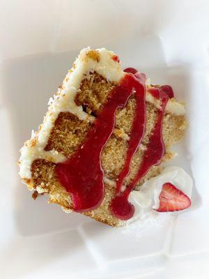 Coconut cake with raspberry drizzle