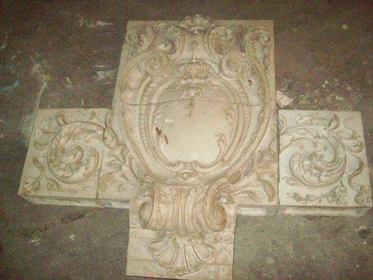 One of three large 5 piece terra cotta exterior cartouche pieces from a 1917 church.