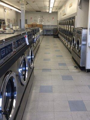 Max, large, and regular washers on left. Dryers on right.