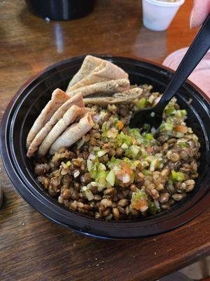 Mix the cucumber salad into the lentils and rice