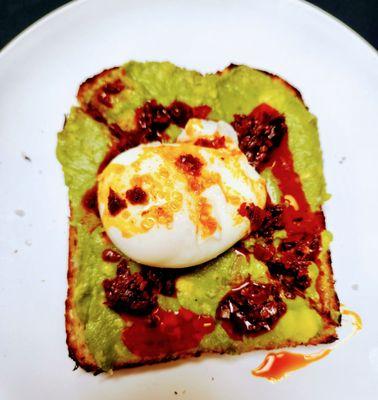 Spicy avocado toast, with an added poached egg.